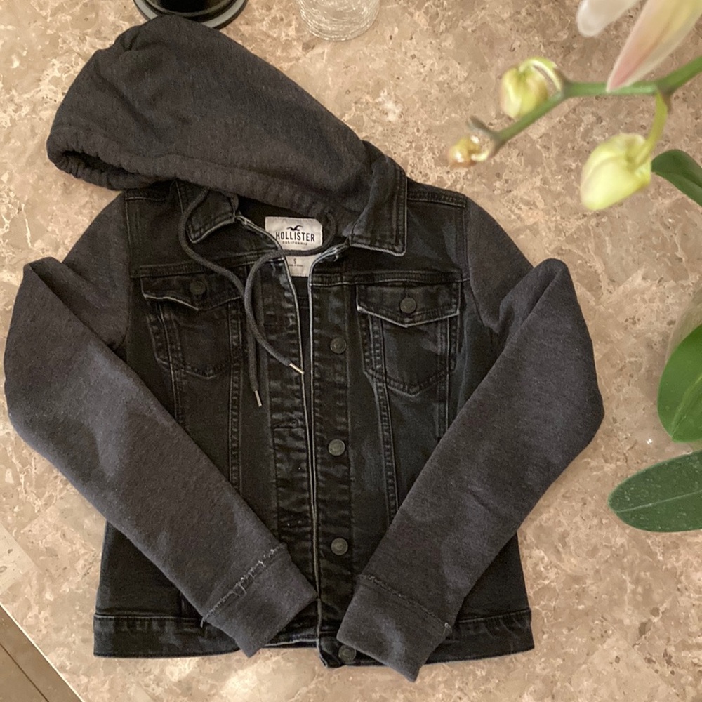 Women’s Hollister Black jean jacket with hoodie.
